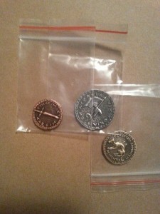 Image is 3 replica Roman coins individually packaged in small ziplock bags.